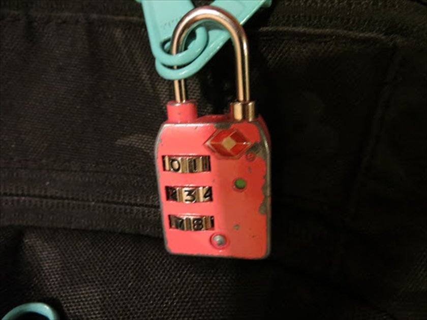 small padlock on a bag