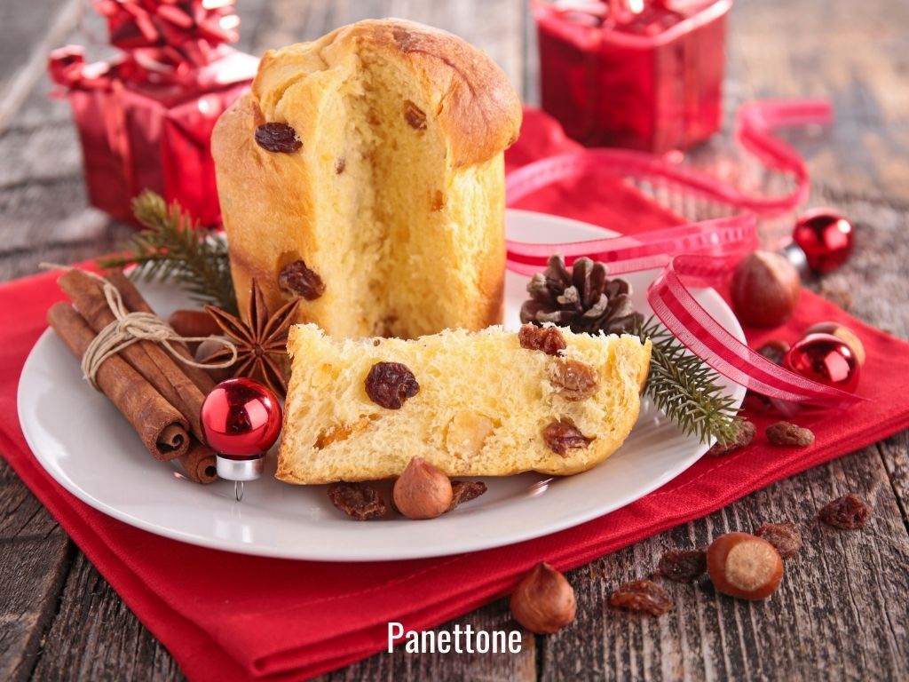 sliced panettone cake on a festive plate