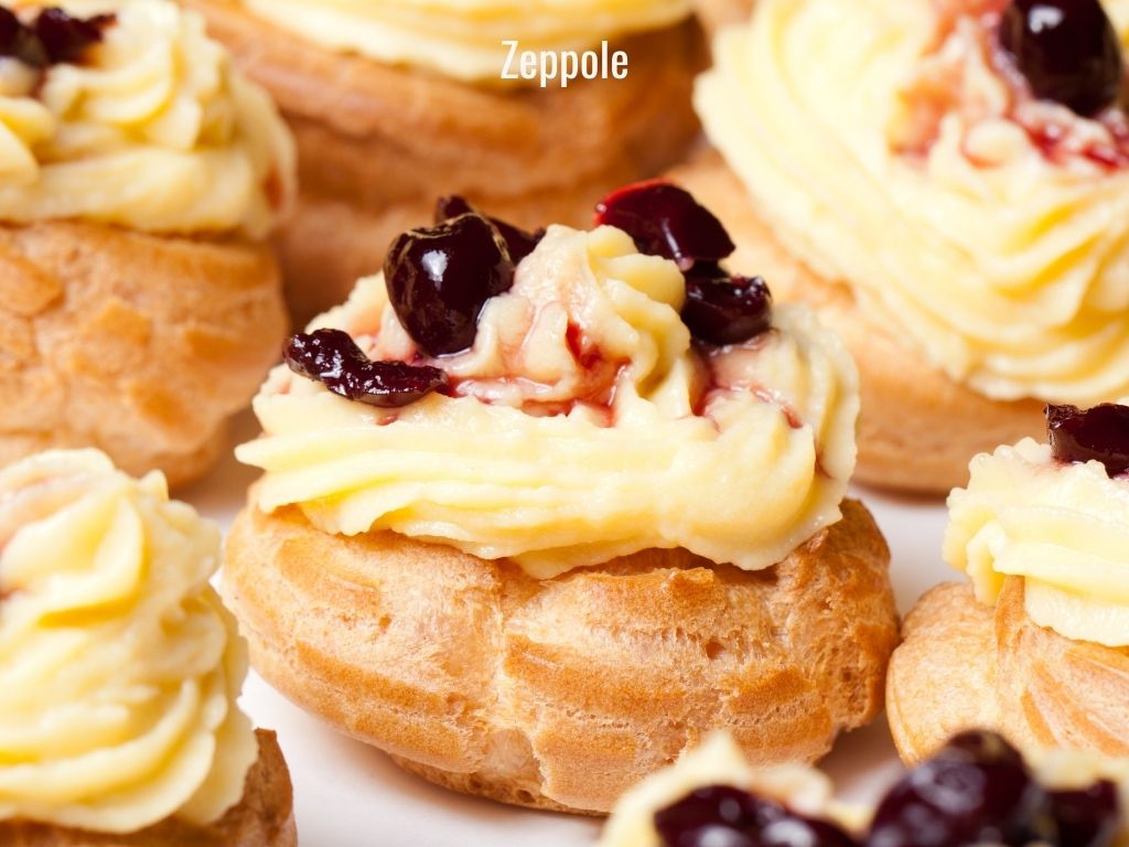 choux pastry with custard and soaked cherries zeppole