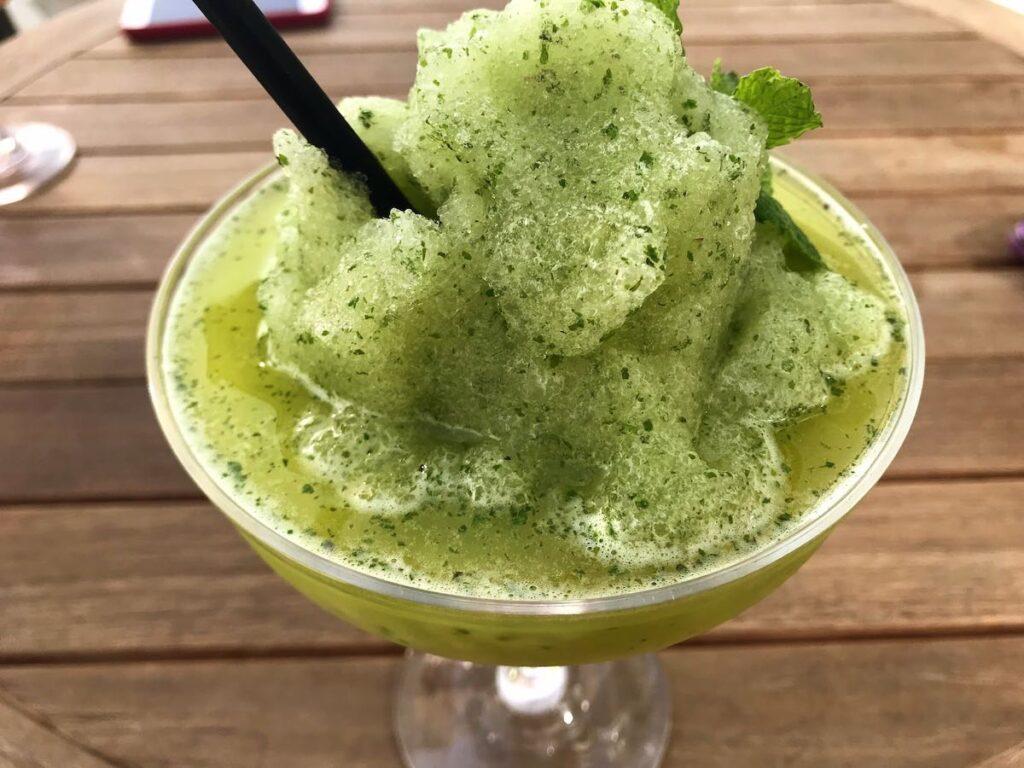 lime and mint frozen dessert in a glass