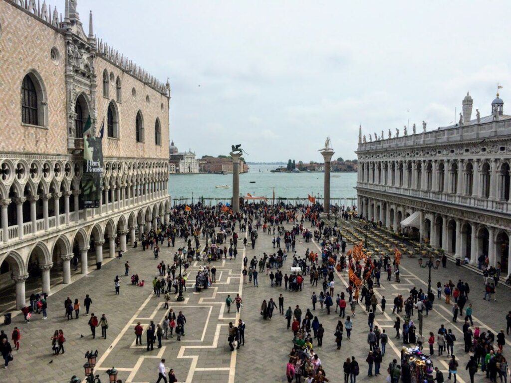 Tall columns in St Marks square with statues on top