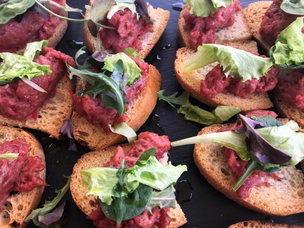 italian bruschetta on black slate