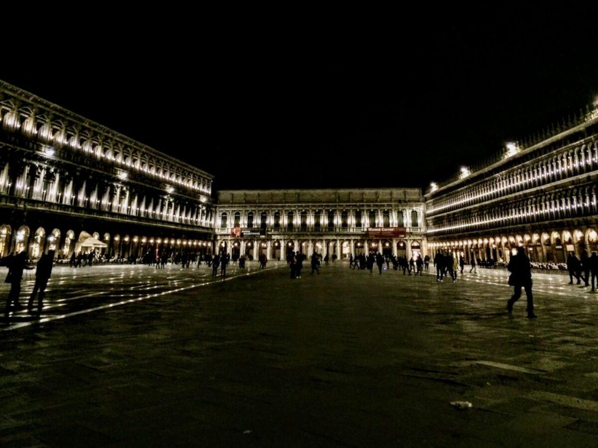 St Mark's Square lit at night.